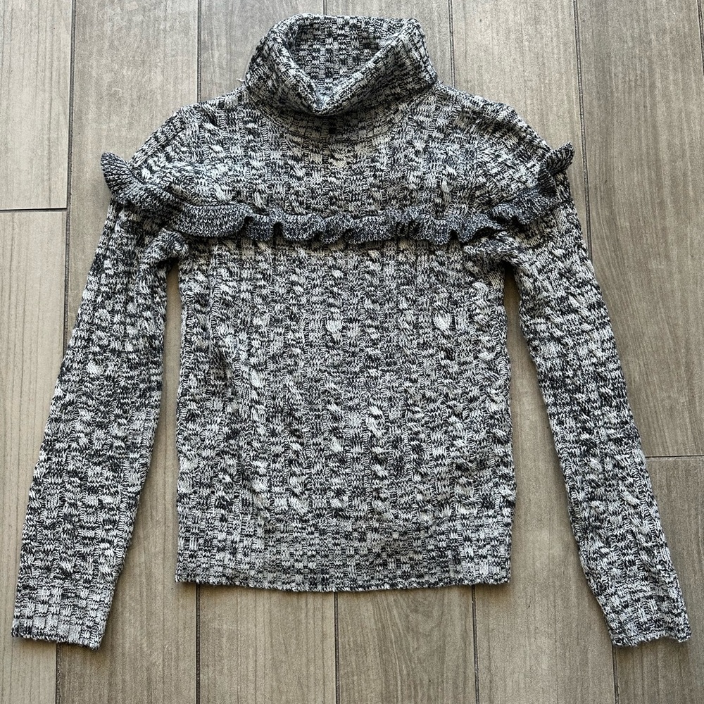 Black& white turtleneck sweater with ruffle